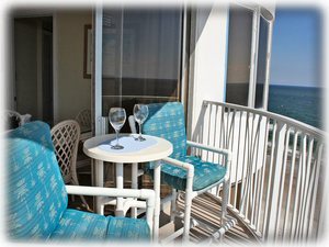 Relax on your comfortable oceanfront balcony