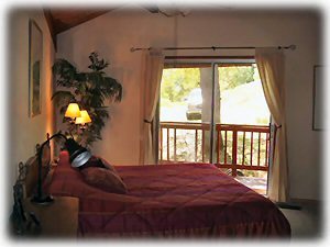 Master Bedroom with access to the wrap around deck